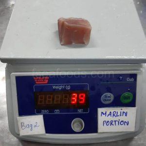 Close-up of high-quality frozen marlin fish cubes, individually quick frozen (IQF), packaged for export by F Seafood Vietnam.